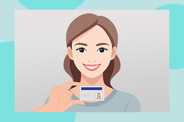 cartoon example of a person holding their ID in a confirmation photo. The person's face is clearly visible, and the ID is being held by the edges so the details are not obscured. Both the person and the ID are in focus and the details and photo on the ID are legible.