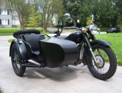 Motorcycle with a sidecar mounted on the righthand side